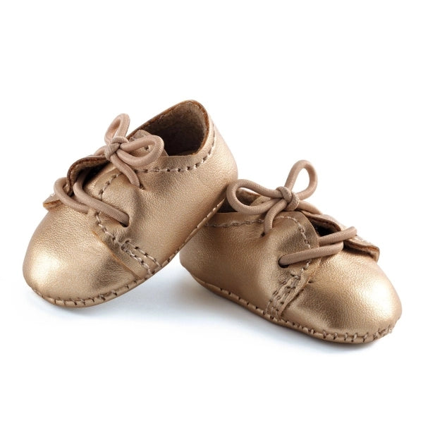 Pomea Puppenschuh gold - von Djeco