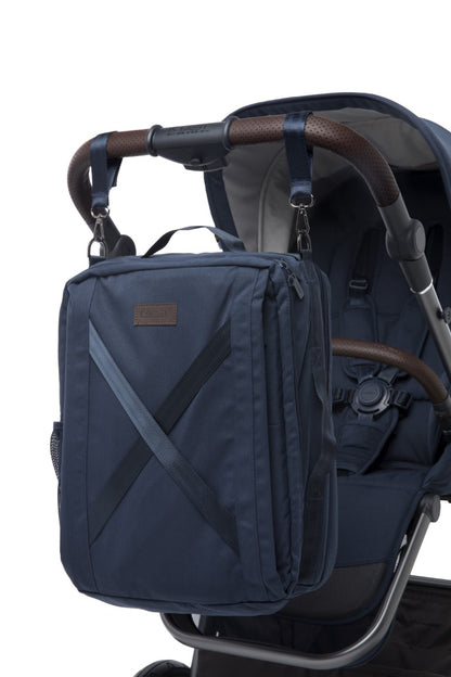 a blue bag on a stroller