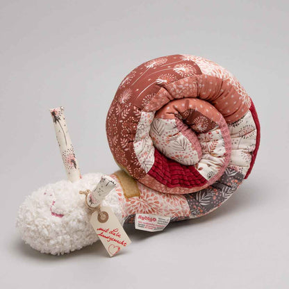 Tinéba Kuschelschnecke Pusteblume rost